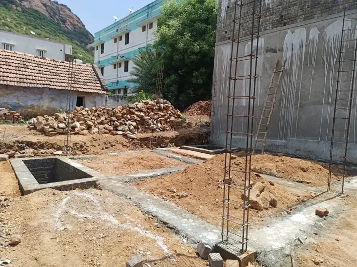 Foundation beams and column reinforcement on a building plot